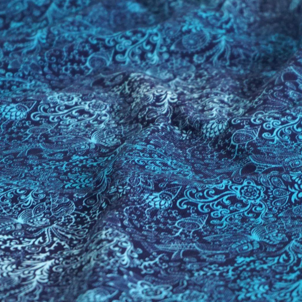 Baumwolljersey Zeichnungen Blüten Kringel blau türkis